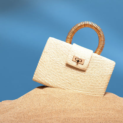 THE GRACIE Cream Woven Straw Clutch Bag